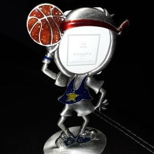 Nickel in color basketball player shaped frame